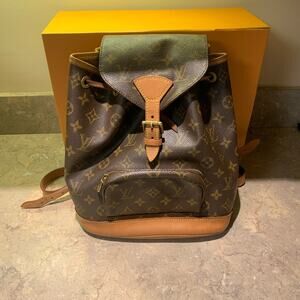 Authentic Louis Vuitton monogram mini backpack with adjustable straps